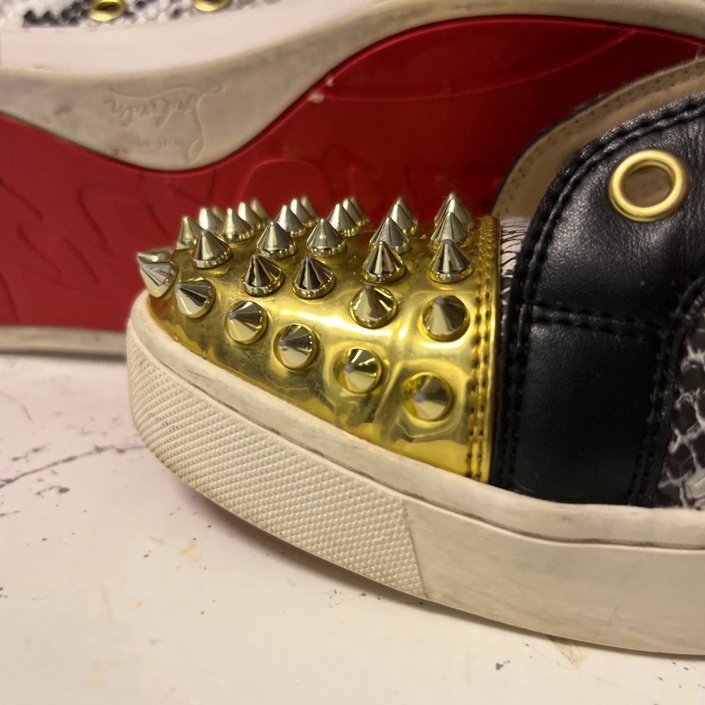 Red bottom spiked sneakers size 8 woman